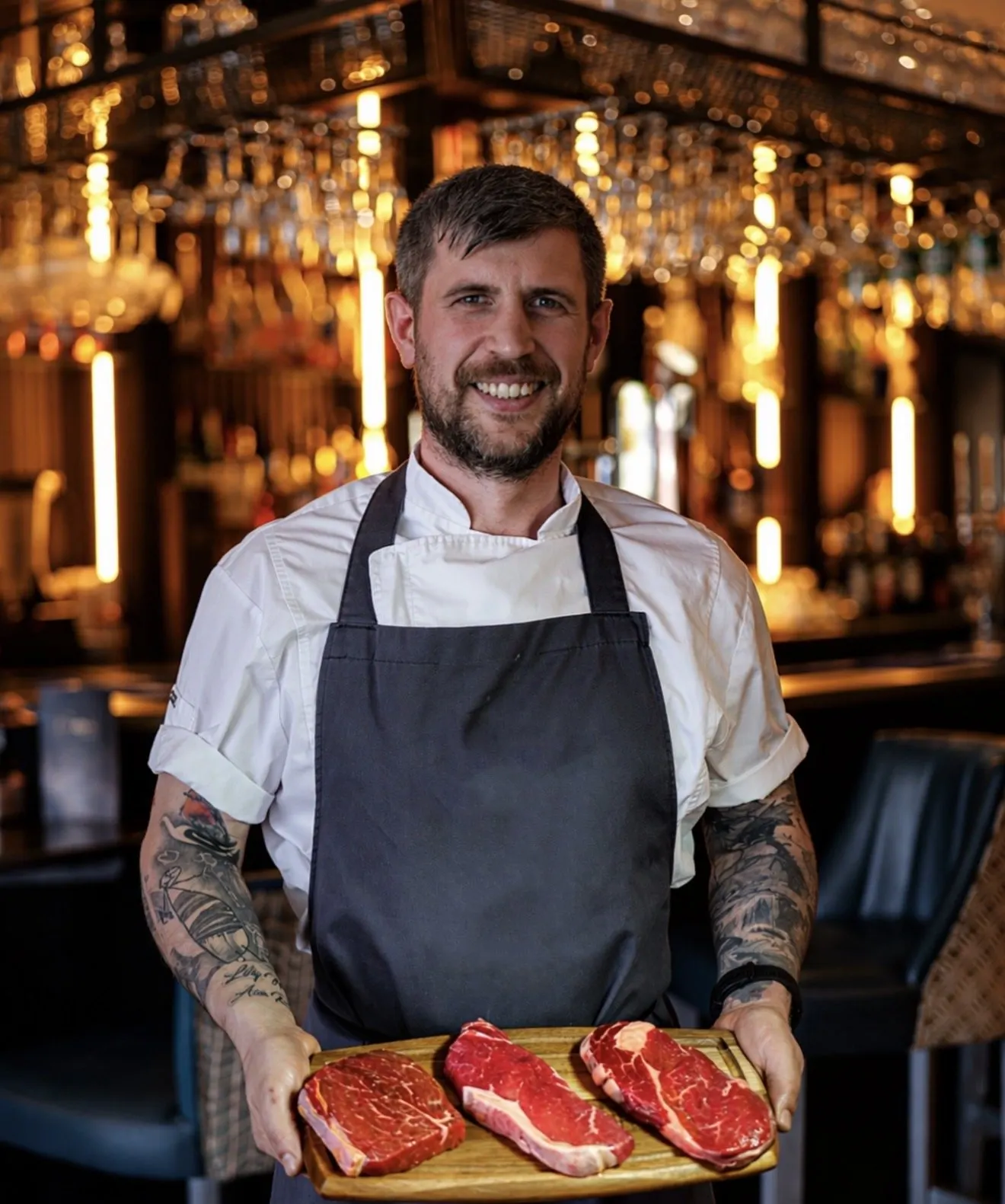 Ian, our head chef, with a board of Barton's steaks